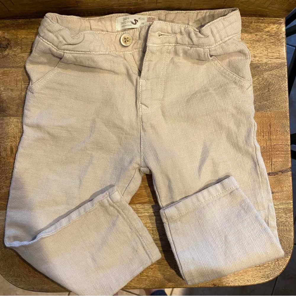 Two pairs of Zara baby boys pants. Size 12-18 month. One navy one beige. Bundled
